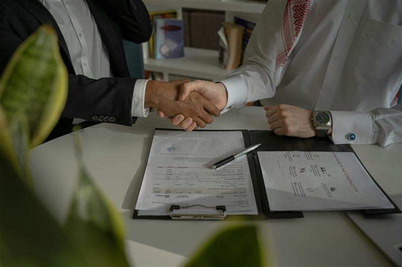 Business partnership handshake — Driram Group